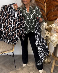 Casualowa bluzka z długim rękawem i eleganckim wzorem