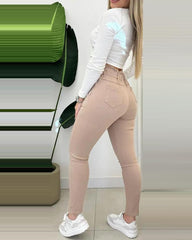 Obcisłe spodnie z podszewką z polaru i sznurkiem w talii