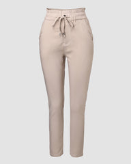 Obcisłe spodnie z podszewką z polaru i sznurkiem w talii