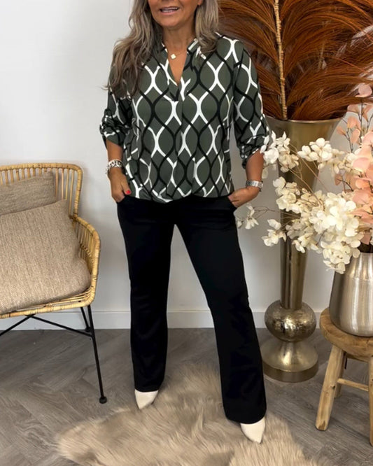 Casualowa bluzka z długim rękawem i eleganckim wzorem