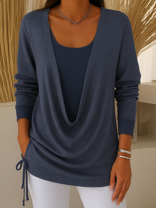 Damska bluzka z długim rękawem i kołnierzem typu swing w jednolitym kolorze, imitująca dwuczęściowy komplet