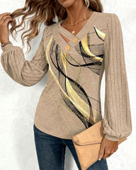 Bluzka w paski z rękawami typu latarnia