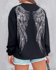 Bluza z długim rękawem i nadrukiem w kształcie serca, ozdobiona kryształkami