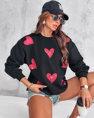 Bluza z długim rękawem i nadrukiem w kształcie serca, ozdobiona kryształkami