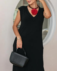 Casualowa sukienka z kieszeniami i dekoltem w kształcie litery V