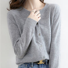 Damska koszula z okrągłym dekoltem, zapinana na guziki, wykonana z dzianiny