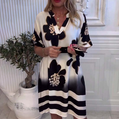 Bezpłatna sukienka damska z nadrukiem i głębokim dekoltem w V