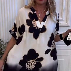 Bezpłatna sukienka damska z nadrukiem i głębokim dekoltem w V