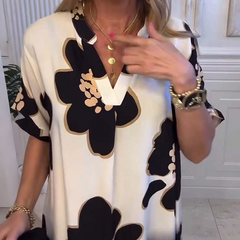 Bezpłatna sukienka damska z nadrukiem i głębokim dekoltem w V