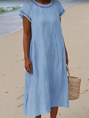Damska swobodna bawełniana sukienka z okrągłym dekoltem i krótkim rękawem i kieszenią