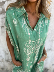 Luźno siedząca krótka sukienka z nadrukiem i kieszeniami