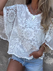 Elegancka damska bluzka z koronką haftowaną