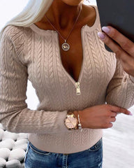 Sweter z dzianiny o luźnym kroju, z okrągłym dekoltem i zamkiem błyskawicznym. Top o dopasowanym kroju