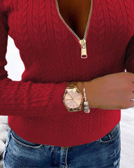 Sweter z dzianiny o luźnym kroju, z okrągłym dekoltem i zamkiem błyskawicznym. Top o dopasowanym kroju