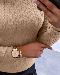 Sweter z dzianiny o luźnym kroju, z okrągłym dekoltem i zamkiem błyskawicznym. Top o dopasowanym kroju