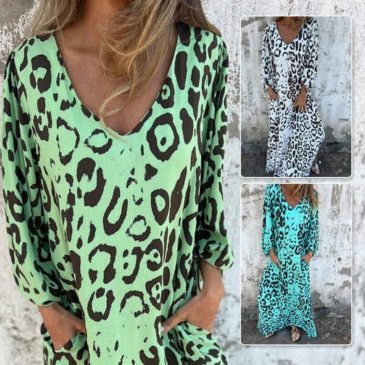 Kwiatowa sukienka z dekoltem i kieszenie